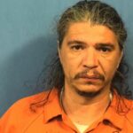 Police officer stopping in for a drink halts West Chicago gas station holdup, prosecutors say